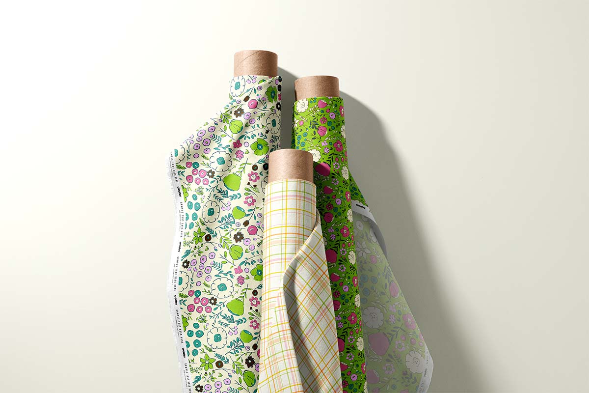 Hand-drawn floral surface pattern design on children’s fabric, suitable for kids apparel and nursery décor.